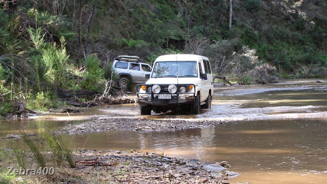 30-Rhino drives up the Aberfeldy River.JPG